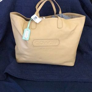 NWT large leather Coach tote. Pristine condition